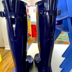 Royal blue hunter boots.  Tall